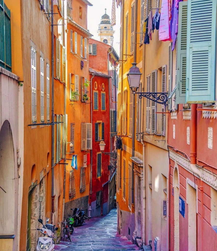 A narrow European alleyway.